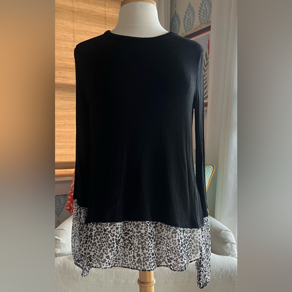 Sweater with faux shirt hem